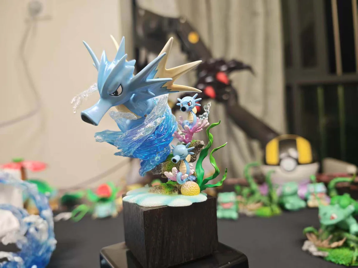 "Duang Zao Jiang's premium 1/20 Horsea, Seadra, Kingdra Pokemon evolution figures, showing dynamic aquatic details and vibrant colors."