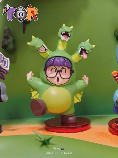 "Unique Arale King Ghidorah crossover figure by TOR-Studios. Playful chibi Arale in a whimsical King Ghidorah costume, radiating mischievous charm."