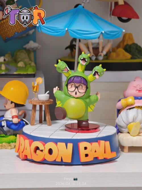 "Gallery of the WCF Scale Arale King Ghidorah Dr. Slump figure by TOR-Studios, showcasing its unique playful chibi design and sculpted details."