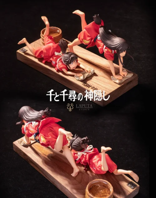 "Premium Spirited Away resin statue showcasing Chihiro and Haku in serene companionship on an elegant black walnut base."