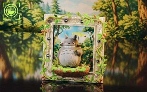 "GEISHA Studio Art Gallery Totoro statue, multiple angles. Shows stylized sculpture, intricate details, and elegant, versatile frame. Limited 50 piece."