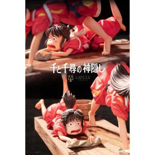 "Authentic Spirited Away Chihiro & Haku resin statue. Close-up reveals premium sculpture details and elegant black walnut base from a new angle."