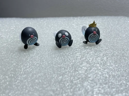 "Artistic monochromatic 1/30 Pokemon Special Poliwag figure set, accurately capturing iconic manga moments."