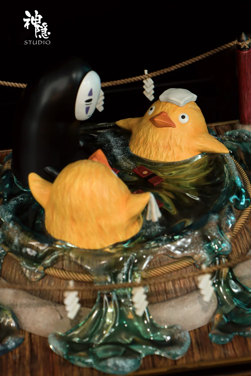 "Serene No-Face & Radish Spirit Bathhouse Diorama, a Spirited Away resin statue with intricate sculpted details from various angles."