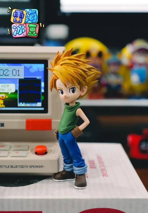 "Playful chibi Yamato Digimon Adventure WCF figure in a dynamic pose, showcasing vibrant colors and his iconic signature attire."
