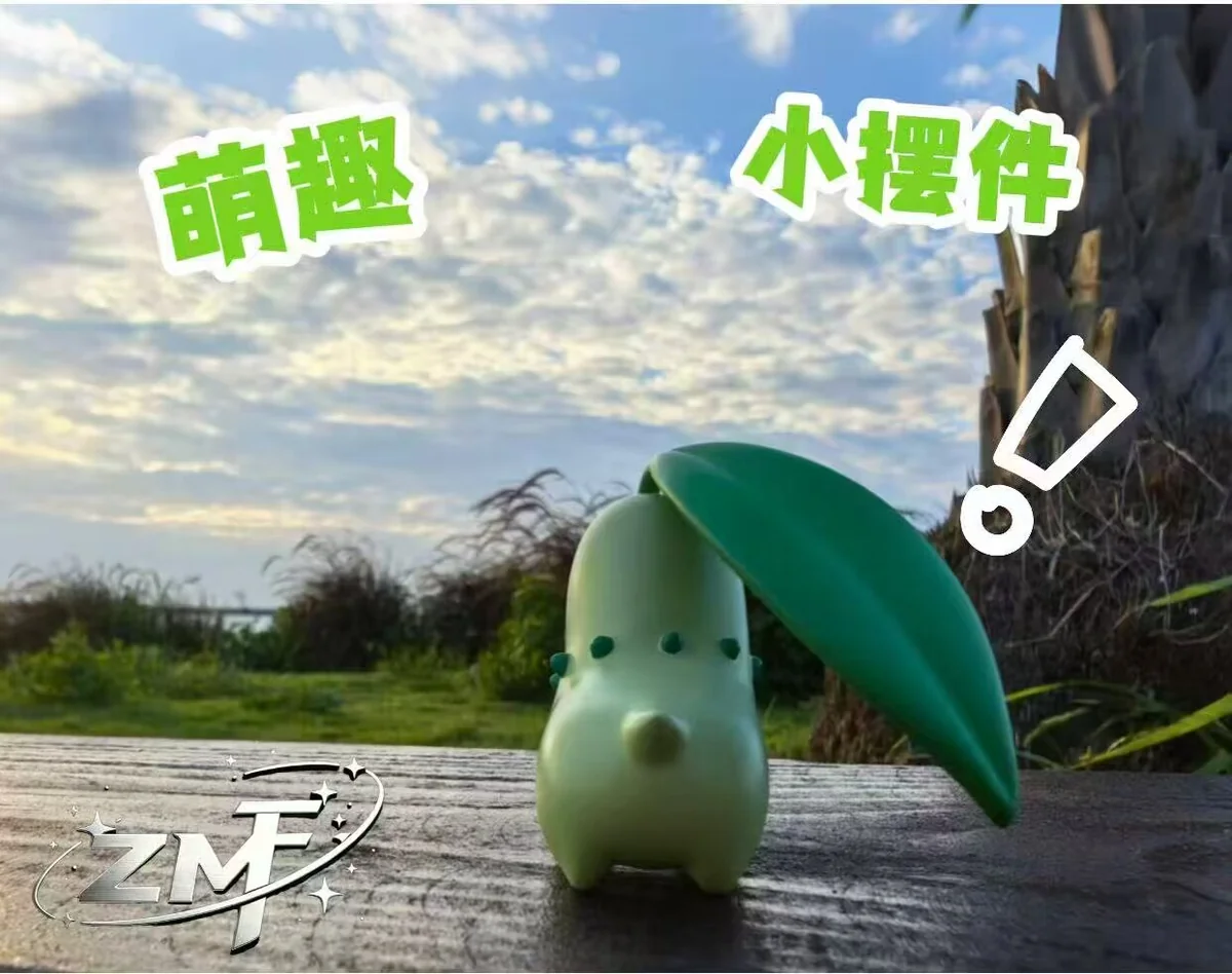 "Hand-crafted Chikorita Serenity Pokemon Figure, Limited Edition. Ethereal sculpt, translucent botanical details, clear base. All angles."
