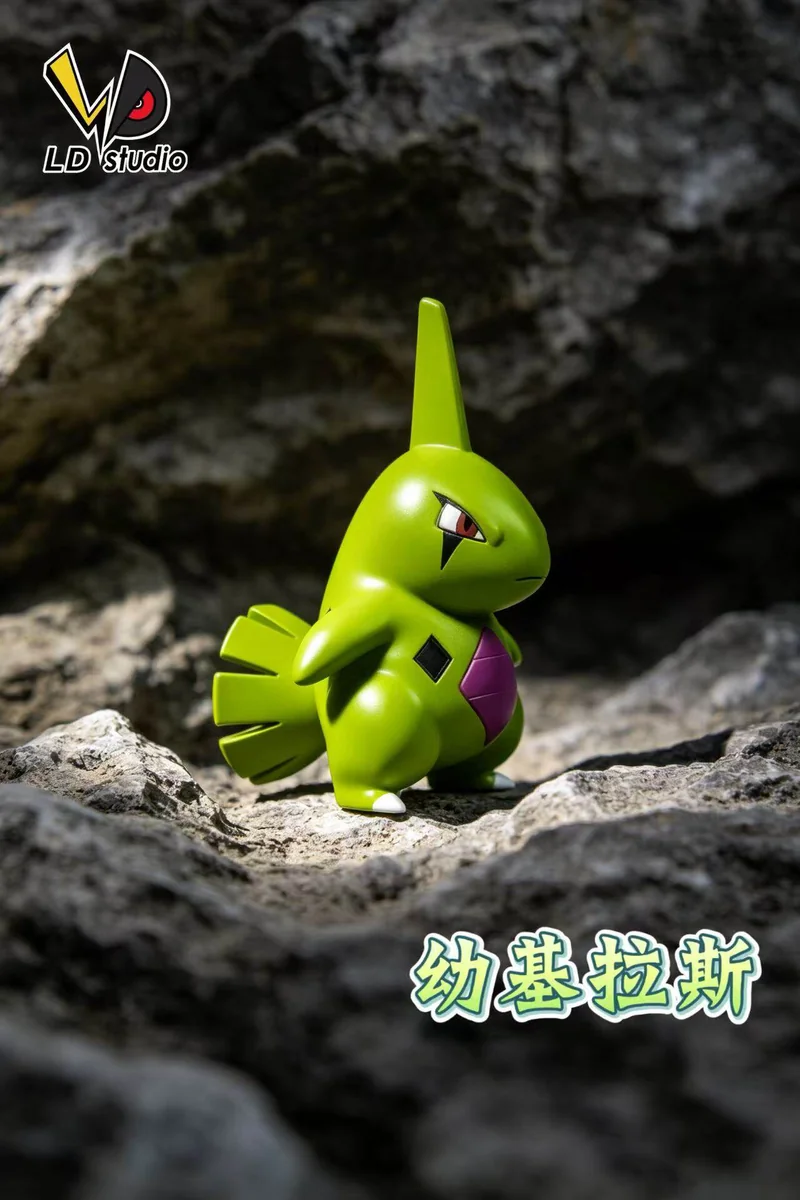 "Playful 1/10 Larvitar Pokemon figure. Limited edition collectible showing adorable design, rock base, and intricate sculptural details."