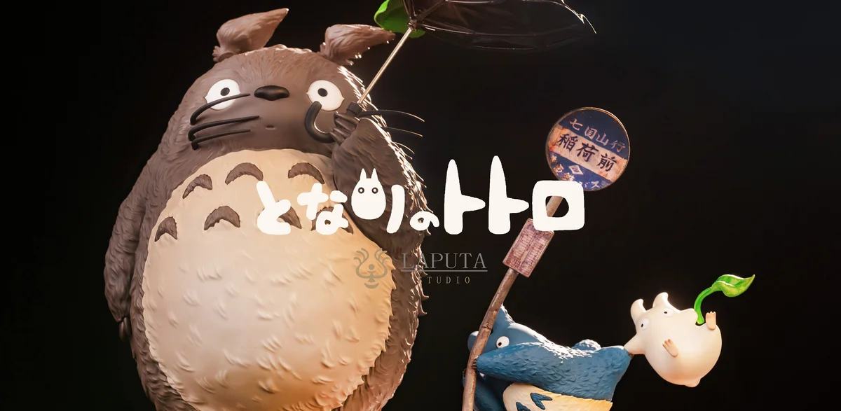 "A detailed view of the dynamic Totoro: Wind Advisory resin statue by LAPUTA-studio, showcasing its whimsical wind-swept scene and intricate details."