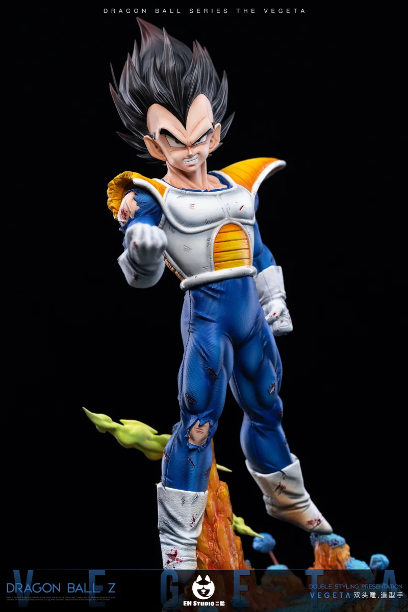 "Dynamic Dragon Ball Vegeta statue in a battle-ready pose, featuring vibrant LED light-up effects and premium interchangeable dual head sculpts."