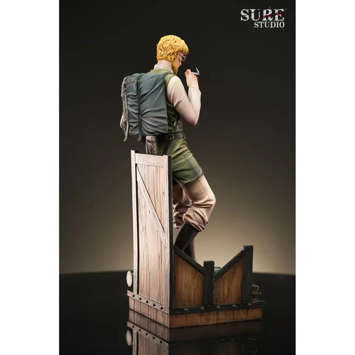 "Dynamic 1/6 scale premium resin statues of Reiner Braun and Zeke Yeager from Attack on Titan, showcasing intricate battle-ready details from multiple."