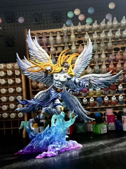 "Limited Edition Angemon Digimon Adventure resin statue. Majestic celestial warrior in dynamic flight, divine power, and intricate details."