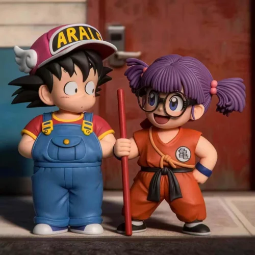 "Vibrant, playful chibi Goku & Arale figure by TOR Studio. This exclusive Dragon Ball & Dr. Slump crossover cosplay statue set captures their fun."
