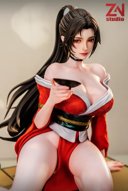 "Exquisite 1/4 Mai Shiranui Tipsy statue from King of Fighters, featuring her elegant, relaxed pose in a subtly lit Japanese setting."