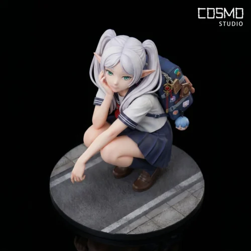 "1/6 Frieren Academy Frieren statue by Cosmo Studio. Premium, detailed views of her unique uniform, backpack, Himmel pendant, and sculpting."