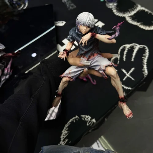 "A dynamic, aggressive 1/6 scale Kaneki Ken Tokyo Ghoul statue by Wanxiang Studio, showcasing intricate details of his powerful Kagune from various."