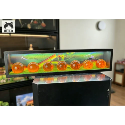"GULU-studio 1:1 Dragon Ball LED display resin statue, featuring mystical glowing Dragon Balls, realistic grass, wood base, and clear acrylic."