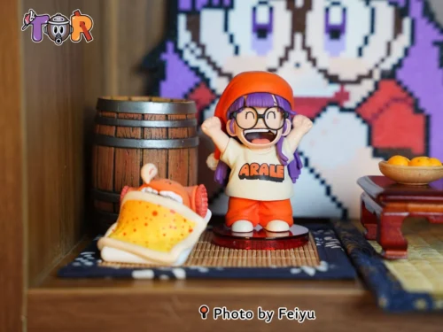 "Energetic Arale WCF figure by TOR-Studios, showcasing her iconic cheerful morning pose with Little Sun, captured from a playful angle."