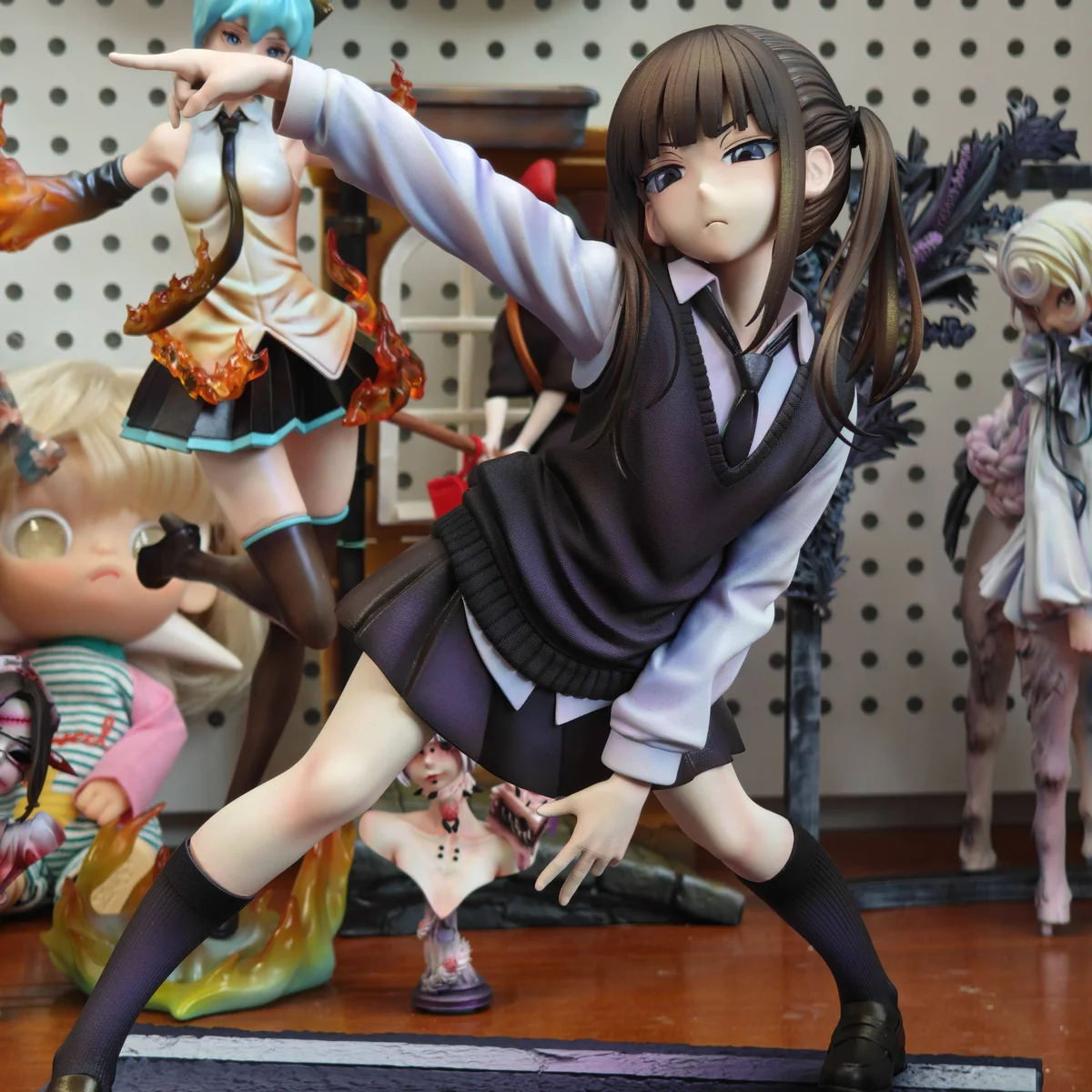 "QAQ-Studio Hoshino twin-tail schoolgirl figure. Exquisite dynamic pose, vibrant uniform, and charming sculptural details captured from various angles."