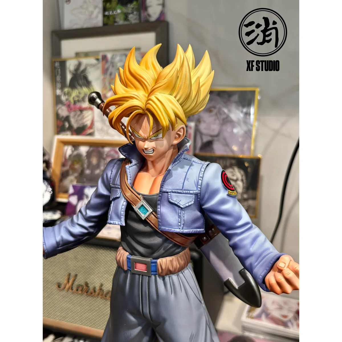 "Detailed views of the limited edition XF STUDIO Super Saiyan Trunks Dragon Ball statue, highlighting its dynamic pose and intricate sculpt details."