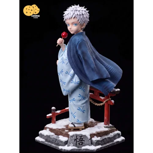 "Detailed gallery of the premium Limited Edition Childhood Gojo Satoru resin statue. Views highlight intricate sculpture, glowing LED eyes."