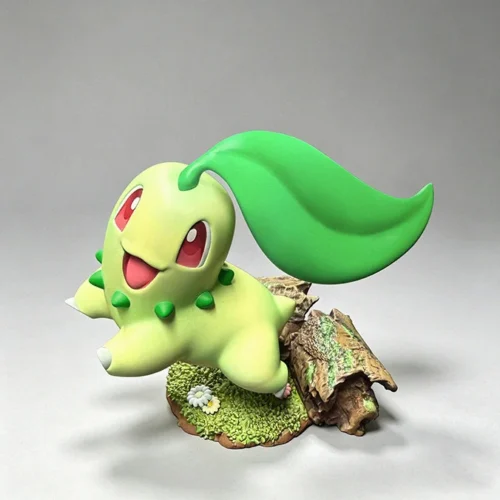 "Charming 1/10 Chikorita Pokémon figure by miumiu Studio, playfully enjoying a peaceful 'Leisure Time' in a whimsical, serene natural setting."