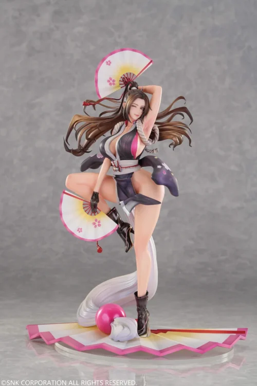 "Premium 1/6 Mai Shiranui KOF figure in a dynamic martial arts pose, featuring the vibrant MA-man graffiti art collaboration backdrop."