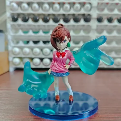 "Vibrant Ayase Momo WCF figure from Dandadan by ONE Studio, showcasing her dynamic pose and supernatural energy on a cool double base."