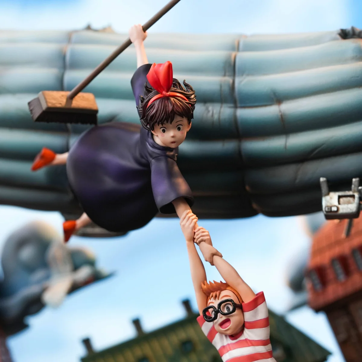 "A detailed, exquisite Kiki's Delivery Service 'Magic Recovery' city diorama resin statue, showcasing intricate sculpting and vibrant colors."