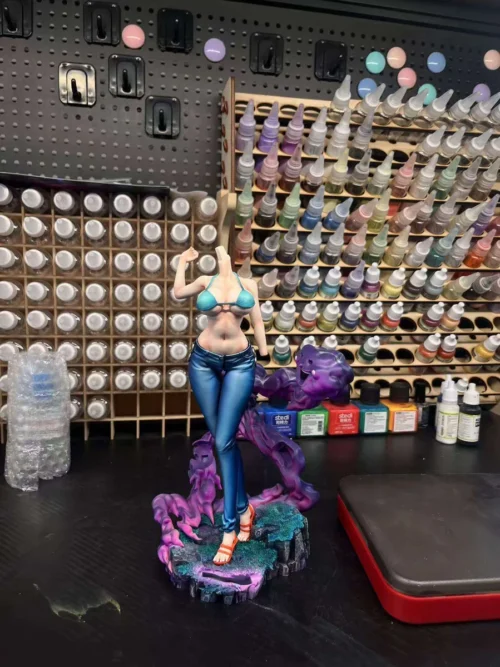 "Dynamic 1/7 Nami (Post-Timeskip) One Piece figure with unique 2.5D paint. See vibrant colors and intricate sculpted details from various angles."