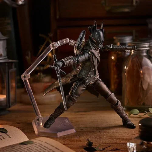 "Premium articulated Bloodborne Hunter figma, Old Hunter Ver. Gallery views show its dark gothic aesthetic, intricate attire, and weaponry."