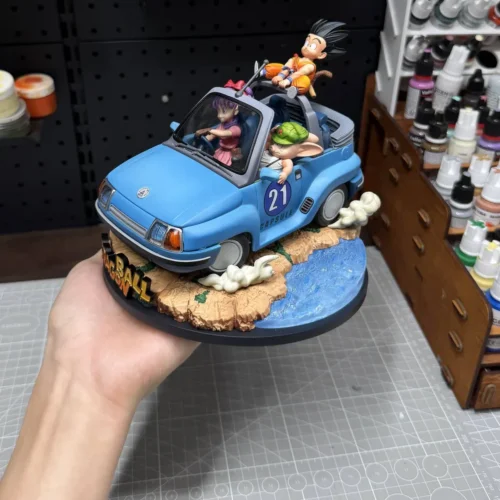 "Limited Edition QK Studio Dragon Ball diorama figure of Goku, Bulma, Master Roshi in playful blue buggy. View details."