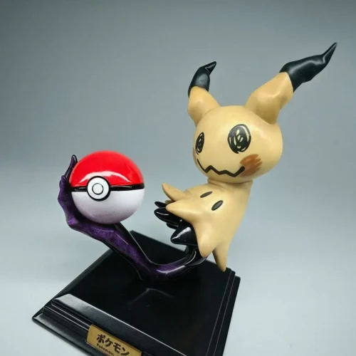 "Detailed gallery of the limited edition Mimikyu Pokemon statue by Miumiu Studio. View playful Mimikyu in a dynamic pose, capturing charming."