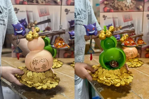 "Artistic Gengar & Calcifer LED resin statue, glowing mystically to attract fortune, a unique Pokémon Howl's Moving Castle display."