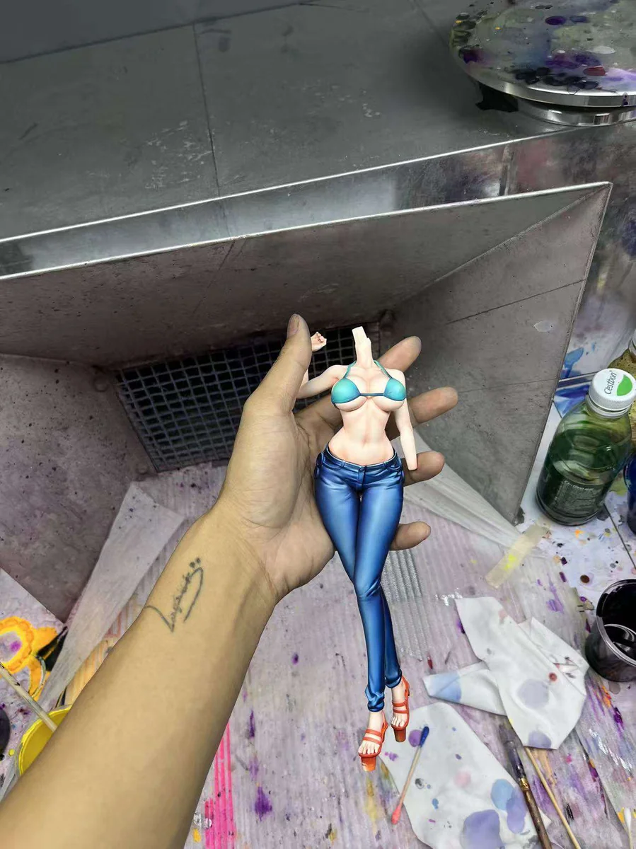 "Limited edition 1/7 Nami Post-Timeskip One Piece figure. Dynamic pose and vibrant 2.5D paint style. Explore sculpted details from multiple angles."