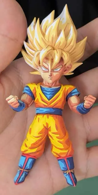 "Dynamic close-up views of the Zzz Studio limited edition Goku & Vegeta Dragon Ball statue, highlighting its manga-panel inspired sculpting."