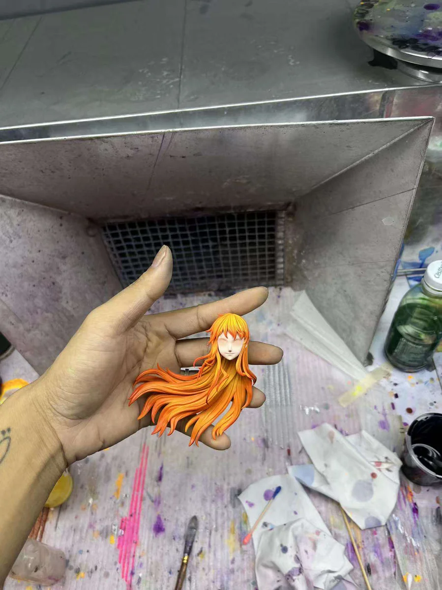 "Limited edition 1/7 Nami (Post-Timeskip) One Piece figure. Dynamic pose, vibrant 2.5D paint style, and intricate sculpted details."