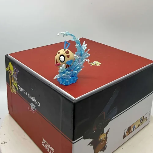 "Exclusive 1/24 Feebas PokƩmon Adventures figure. Artistic close-up reveals whimsical aquatic details and intricate sculpture from a unique angle."