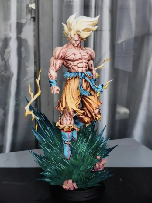 "Dynamic 1/4 & 1/6 Super Saiyan Goku LP Studio statue in mid-air with powerful energy effects, featuring impressive dual head sculpts from Dragon Ball."