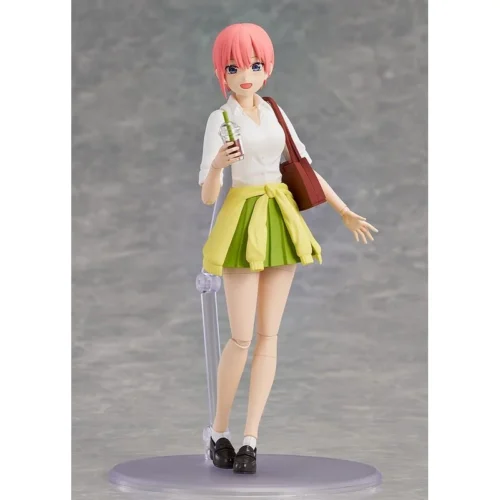 "Playful Nakano Ichika model kit from KADOKAWA Studio, dynamically posed with a charming expression, highlighting authentic quality and build-it-yours."