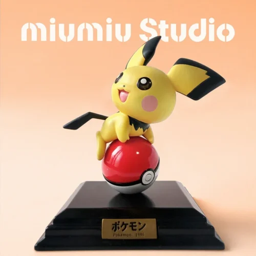 "Exclusive limited edition 1/10 Pichu Pokémon figure by Miumiu Studio, vibrantly posed emerging playfully from a classic Poké Ball."