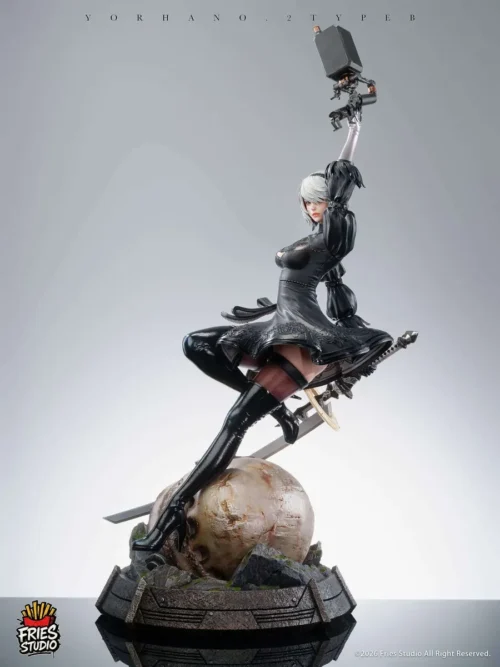"Premium 1/3 scale NieR Automata 2B statue, dynamically posed, showcasing intricate details and interchangeable heads for collectors."