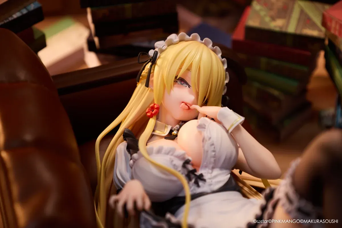 "Exquisite Ariko Bishoujo Mangakyo statue from Pinkmango Studio. Elegant pose on a sofa, highlighting alluring design and intricate sculpt details."