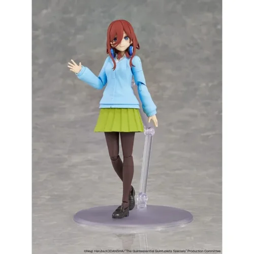 "Authentic KADOKAWA Nakano Miku Model Kit. Charming Miku in her school uniform, iconic headphones, and dynamic pose, showcasing anime-accurate details."