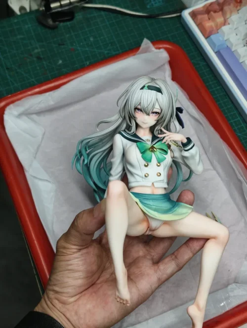 "Premium 1/6 Firefly Honkai Star Rail resin statue. Multi-angle details reveal her contrasting persona in a desk scene. Limited edition."