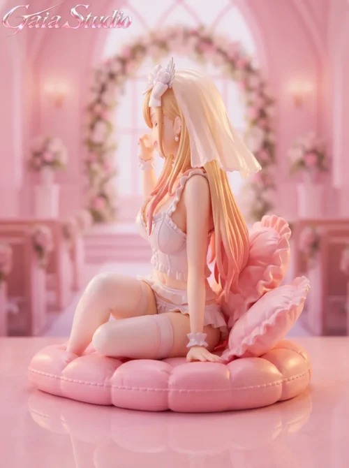 Side view of the limited 88-piece Marin Kitagawa 1/6 figure in pink bridal lingerie and veil, sitting on a soft cushioned base.
