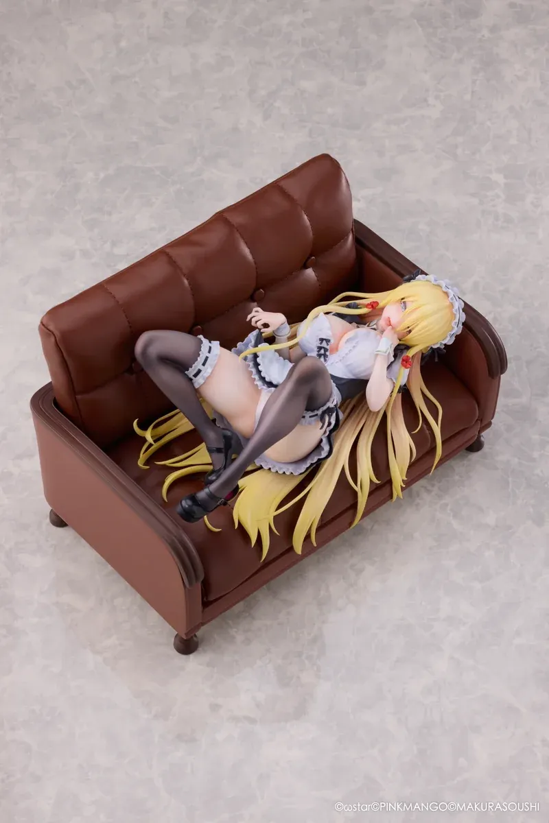 "Exquisite Ariko Bishoujo Mangakyo statue from Pinkmango Studio. Elegant pose on a sofa, highlighting alluring design and intricate sculpt details."