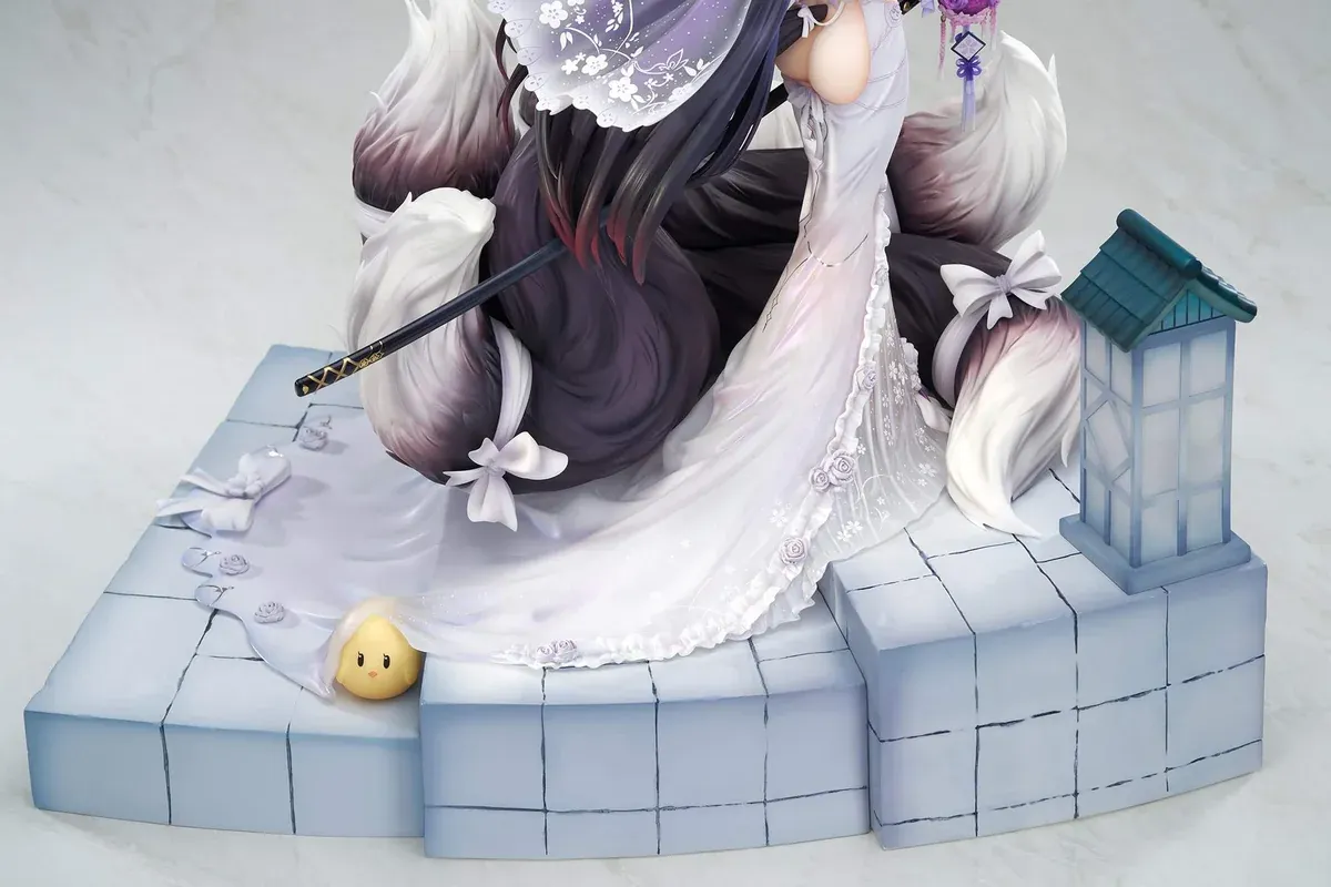 "Premium acrylic display case with integrated LED lighting, elegantly illuminating the official 1/7 Azur Lane Kroos Wisteria Heart statue."