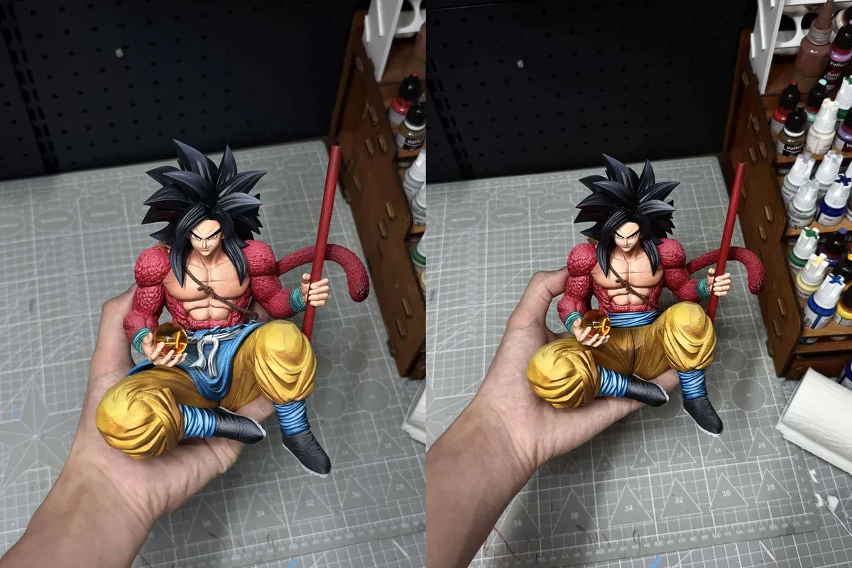 "Limited edition 1/6 Super Saiyan 4 Goku Dragon Ball GT statue by Ranyao Studio. Dynamic sitting pose with staff and rocky base."