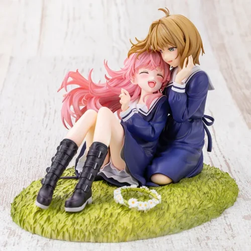 This Kotobukiya Shina Mimi figure statue shows two schoolgirls in navy uniforms sharing a tender embrace with a flower crown on a daisy grass base.
