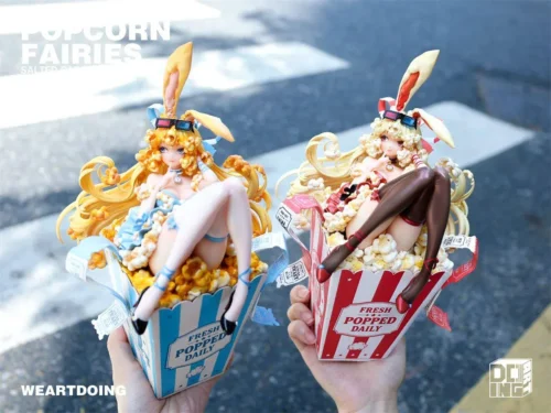 Popcorn Fairies figure duo in retro popcorn buckets with candy bunny ears, limited to 499 hand-sculpted PU resin statues.